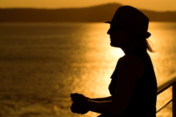Hat mountains Silhouette sunset water woman free photo CC0