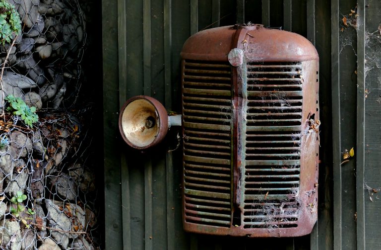 Antique automotive barn garage headlight Old parts Rusty vehicle weathered Worn free photo CC0