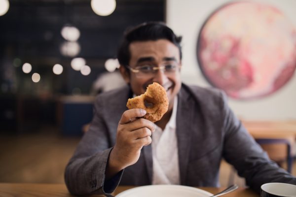 businessman delicious dessert Dinner donut food happy Holding Joy Male man Person Restaurant Suit treat free photo CC0