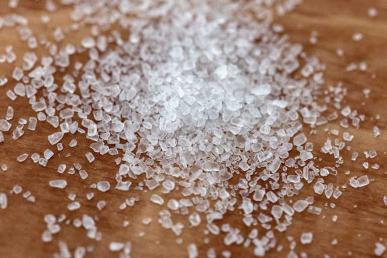 Close-Up cooking crystals grains Ingredients macro mineral salt stone table woodgrain free photo CC0