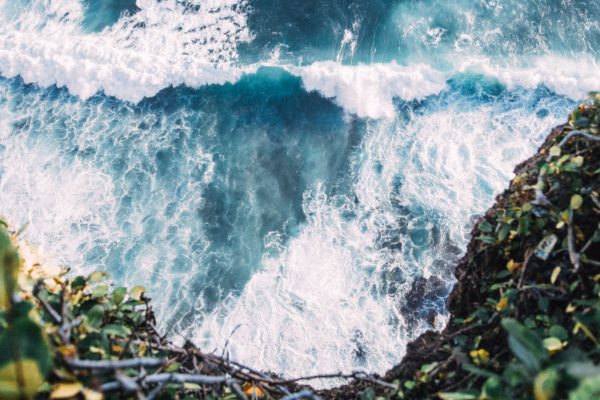 blue Cliff Coast Crashing foam Ocean rocks rocky saltwater sea shore Top water Waves free photo CC0