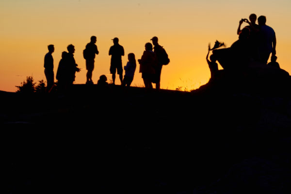 Adventure blur group hiking hill landmark Motion Mountain orange Outdoor Silhouette sky sunset tourists travel Trek Warm free photo CC0