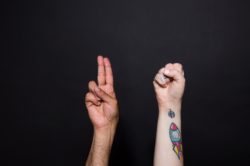 picography-two-hands-sign-the-word-us