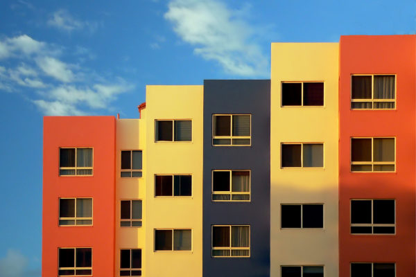 apartments Background block blue building Buildings Cityscape clouds Colorful condominium Day design Modern sky vibrant Windows free photo CC0