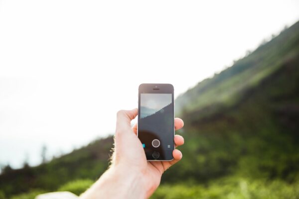 camera cell Day daytime Device Digital Hand hipster Holding landscape mountains nature outdoors Phone photographer Photography Smartphone travel free photo CC0