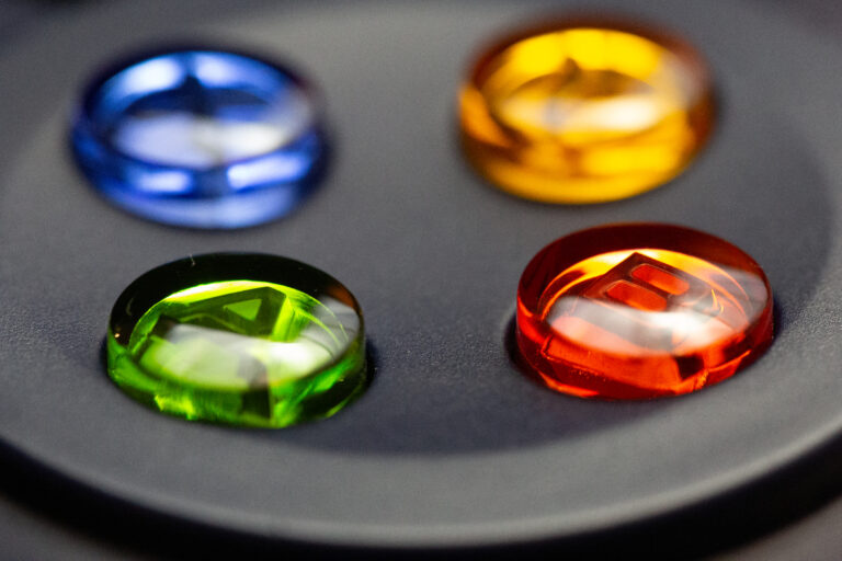 blue Buttons Colorful controller Entertainment focus gadget Game green macro plastic Play red shiny soft tech yellow free photo CC0