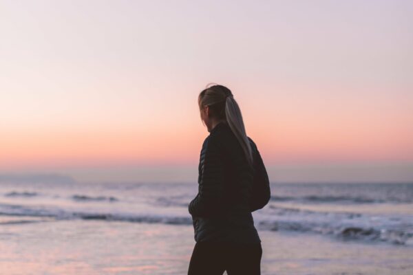 Alone Beach calm Dawn Dusk female girl Healthy mobile wallpaper pastel peaceful Person Pretty Sand sea shoreline Silhouette sky sunrise sunset walking water Waves woman free photo CC0