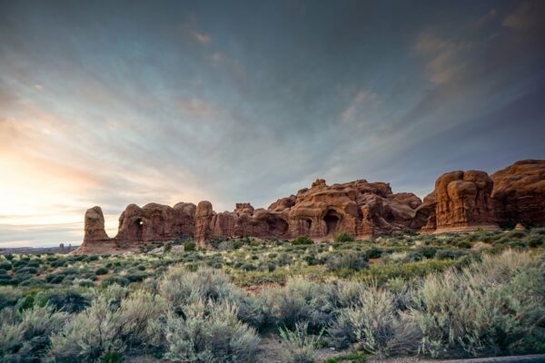 arid arizona Beautiful canyon clouds cloudscape Desert dry grass national nature Outdoor park rocks Sand Scenic sky Sunlight sunrise sunset USA valley free photo CC0