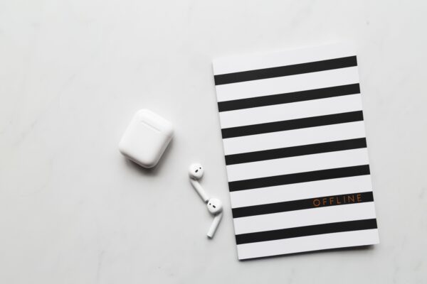 picography-airpods-and-a-notebook-for-tr