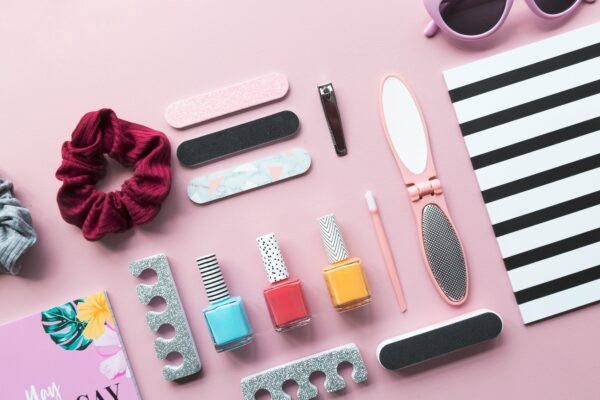 Accessories desk feminine file Flat lay girl Hair lifestyle nail pink polish products stationery Tie free photo CC0