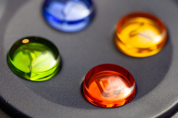 blue Buttons Colorful controller Entertainment focus gadget Game green macro plastic Play red shiny soft video yellow free photo CC0