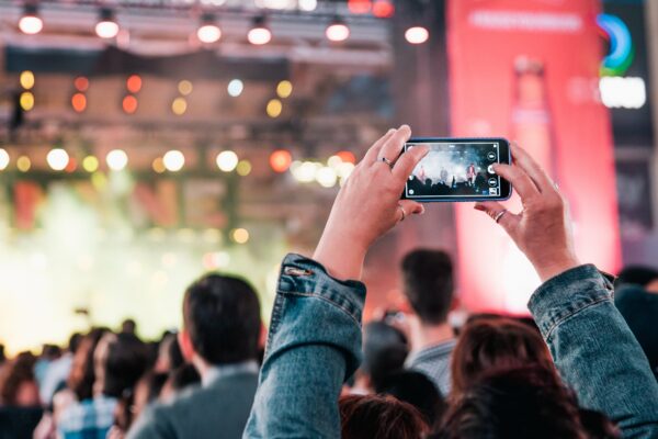 Audience Audio band Concert Crowd Event festival Fun hands lifestyle lights live mobile phone musicians party people performance Phone show Smartphone stage taking photo venue free photo CC0