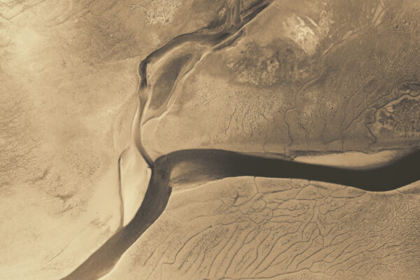 above Aerial Drone dunes landscape monochromatic nature outdoors Pattern Sand tan water wetlands free photo CC0