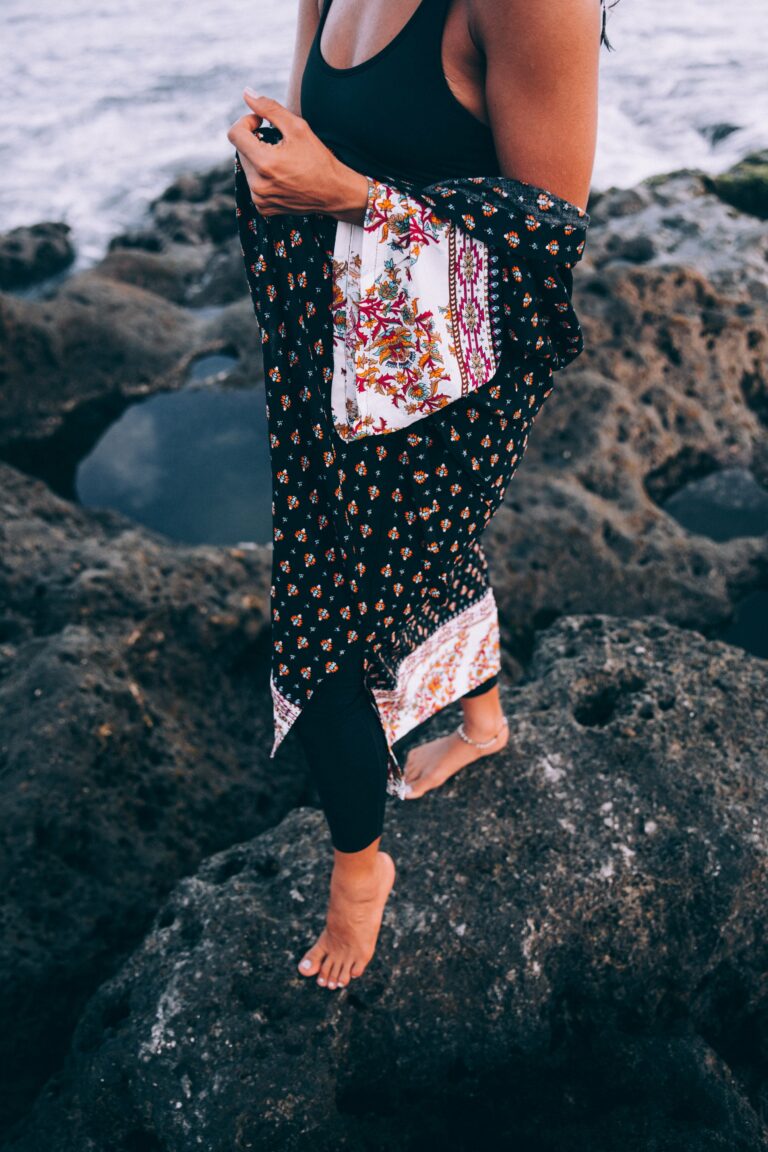 Coast feet female nature necklace outdoors robe rocks shore tan travel Vacation woman free photo CC0