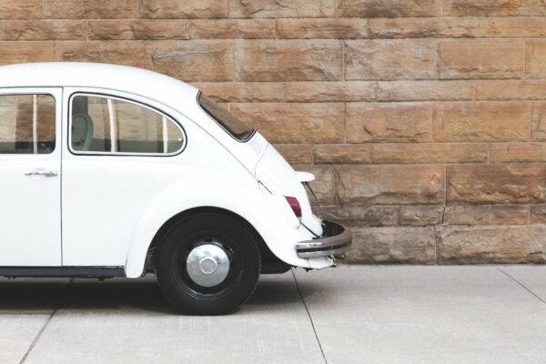 Antique auto automobile automotive brick wall bug car classic Retro vintage vw white free photo CC0