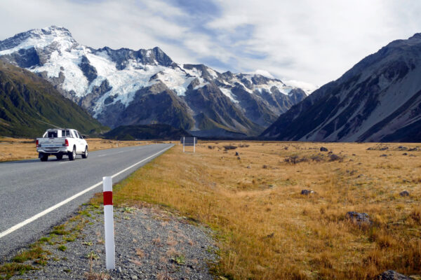Adventure asphalt automobile car clouds Country driving Highway landscape mountains Perspective road rural Scenic sky snow Transport Transportation travel trip truck free photo CC0