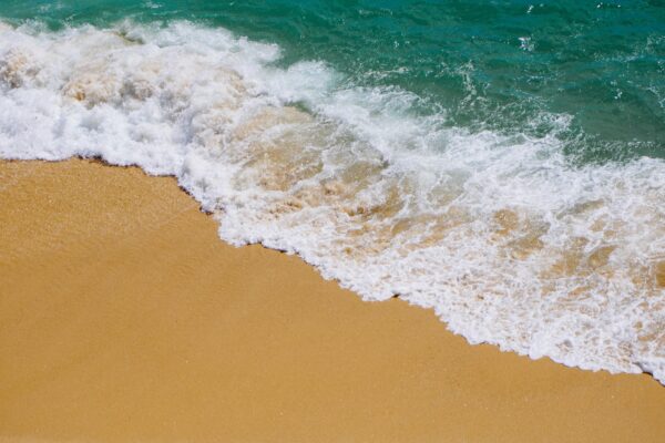 aqua Beach beauty blue Coast foam landscape Ocean saltwater Sand sea shore tide Tropical water Waves Wet free photo CC0