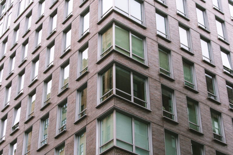 apartments Brick building city citylife corner exterior facade Glass Pattern Structure Urban Windows free photo CC0