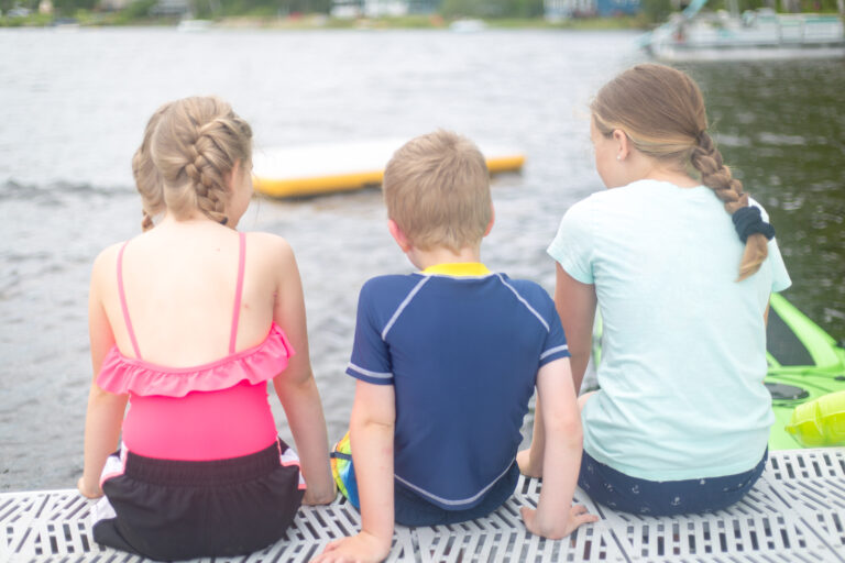 Boy brother childhood Children Dock family friends friendship girl happy kids lake outdoors people sister Sitting summer Vacation water Young free photo CC0
