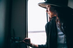 picography-woman-looks-out-train-window