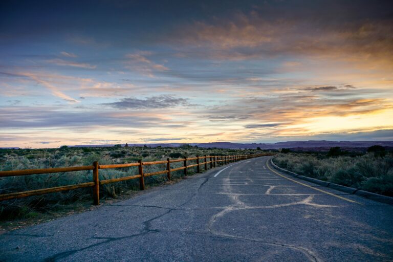 Adventure clouds cloudscape concept Country Dramatic drive driving Empty Fence field future horizon mountains nobody road rural Scenic sky sunset trip wanderlust free photo CC0